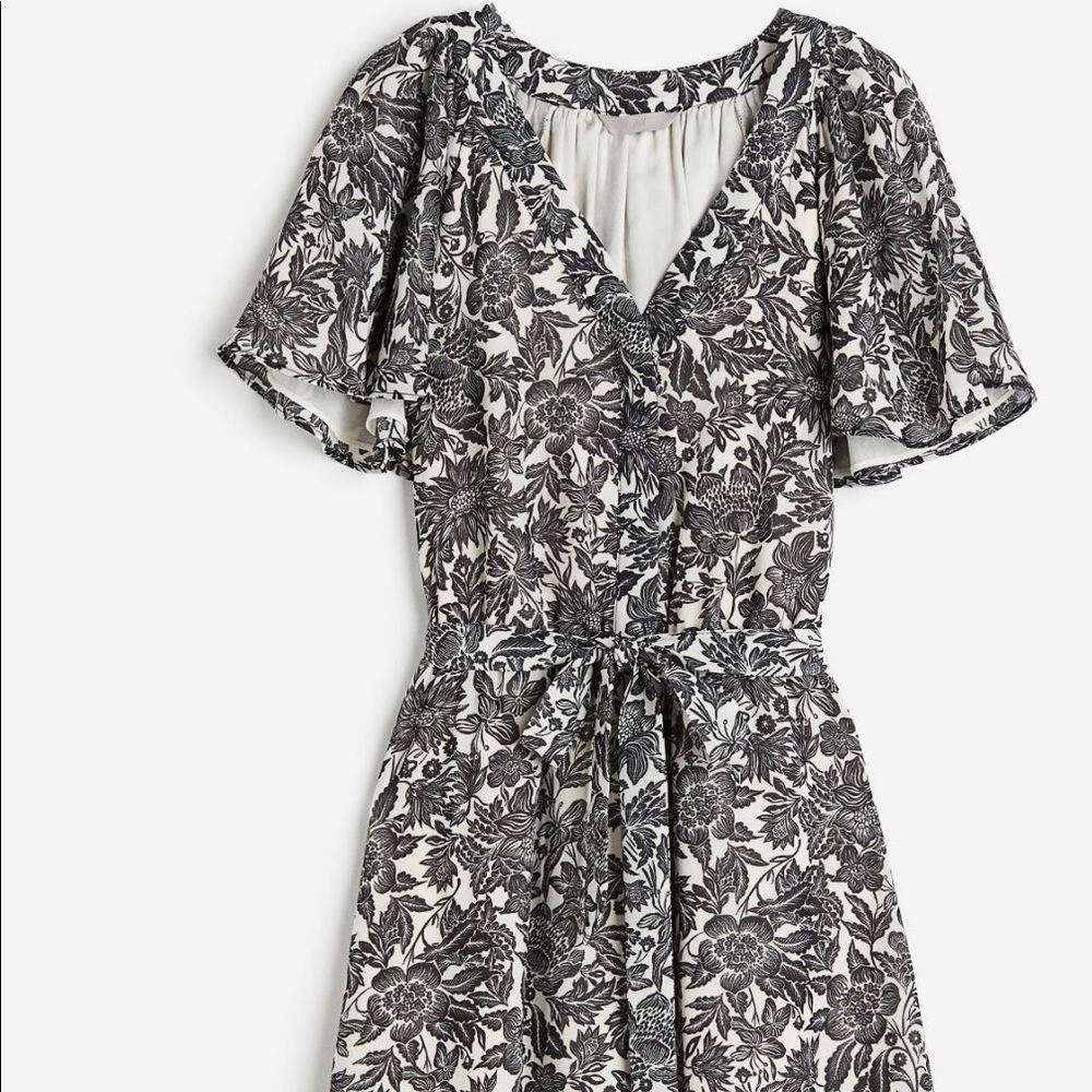 Women’s Black and White floral dress. Great for work.